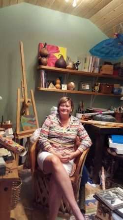 Carol Surrounded by Projects-in-Progress