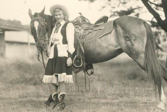 Bitty Redell Rodeo Queen and Amber the horse -- Anderson Collection