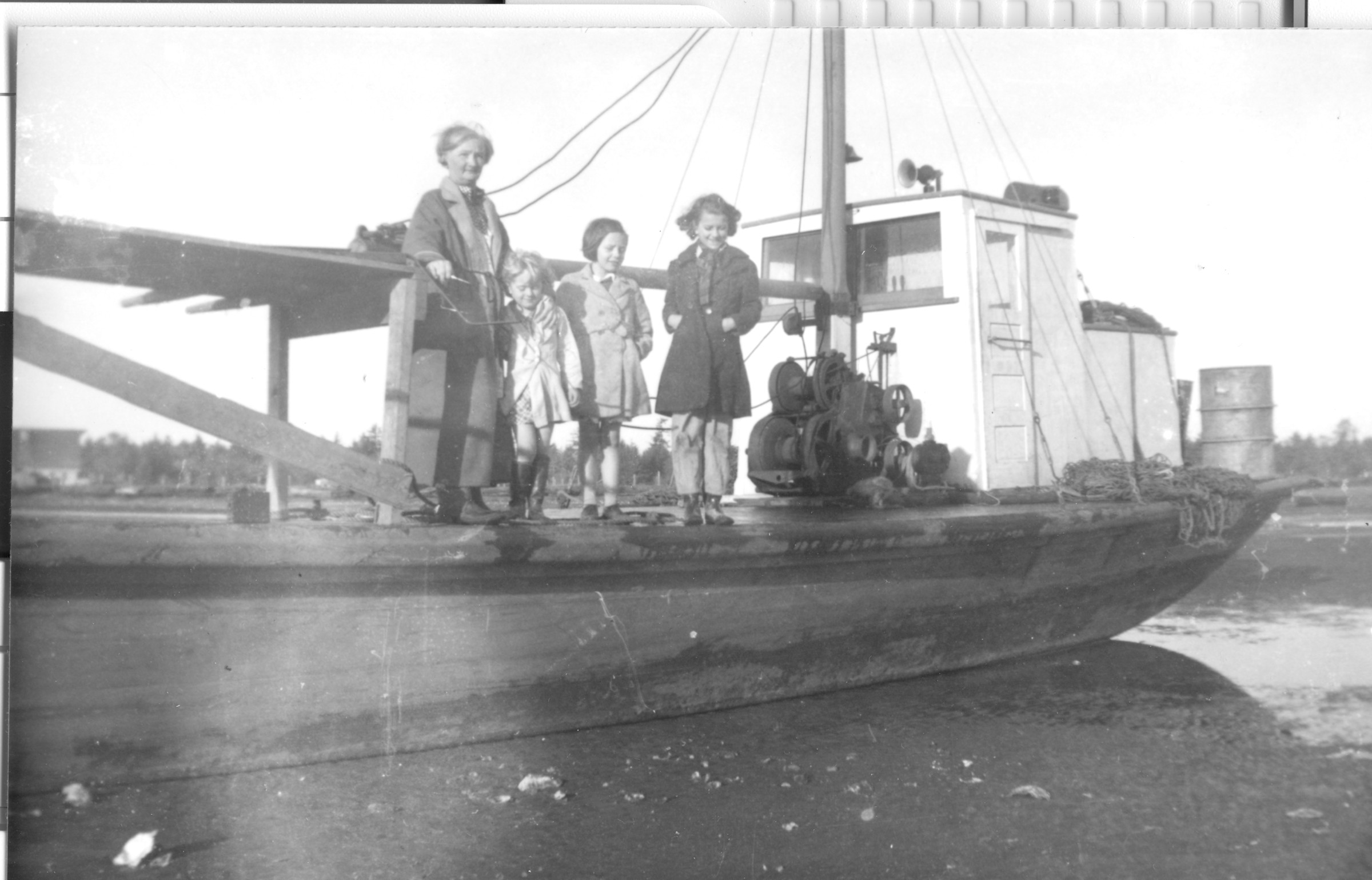 Grandma Biggs and girls on Holway's Dredge Dorothy Ellen